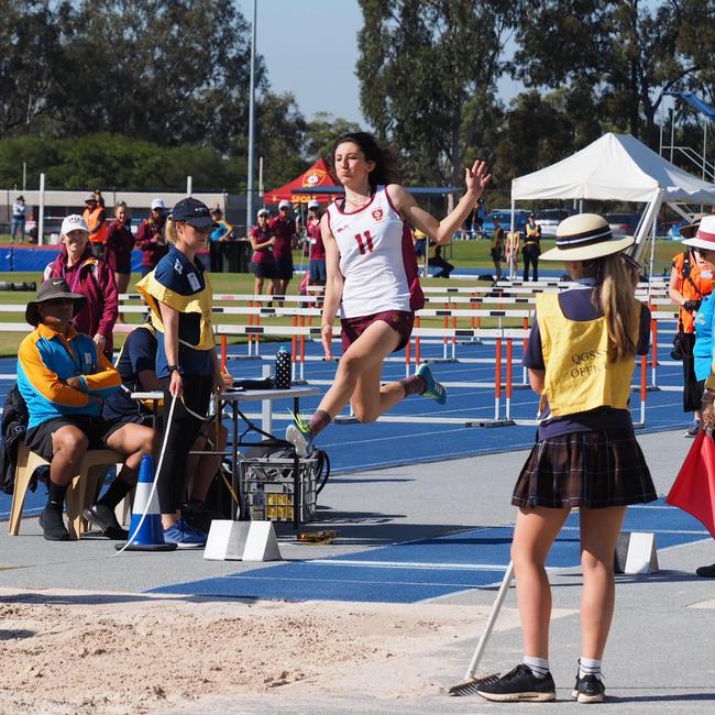 Hilal Durmaz in full flight in the long jump pit for St Peters at the QGSSSA in September. Last weekend she ran 11.54 seconds in the 100m..