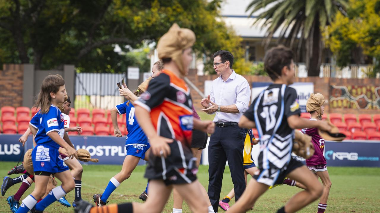 Queensland Rugby League CEO Ben Ikin watches on as TJRL players finish a race during the announcement of a Queensland Maroons Fan Day in Toowoomba ahead of State of Origin Game 2. Picture: Kevin Farmer