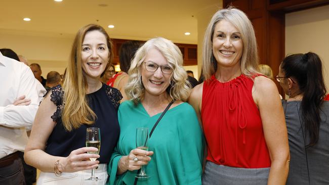 Danielle Carey, Linda Cooper and Wendy Hughes at the Cairns Chamber of Commerce Christmas lunch, held at the Pullman International hotel. Picture: Brendan Radke