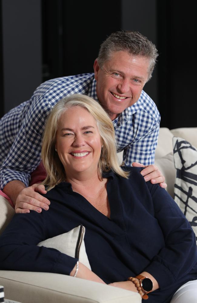 Rebecca Frizelle and husband Brett Frizelle, relaxing at her Southport home. Picture Glenn Hampson