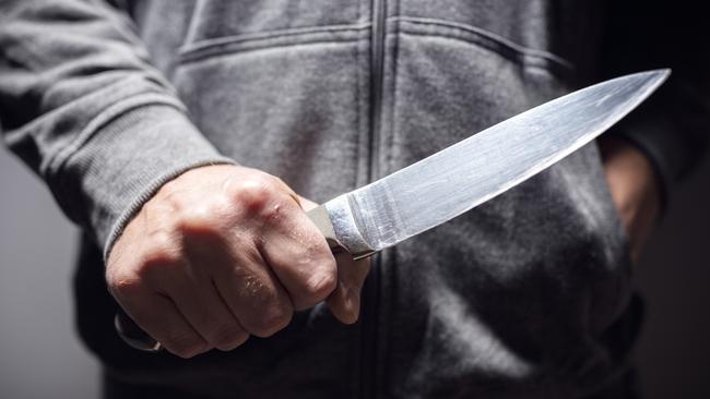 A knife-wielding man threatened parents and kids on a beach.