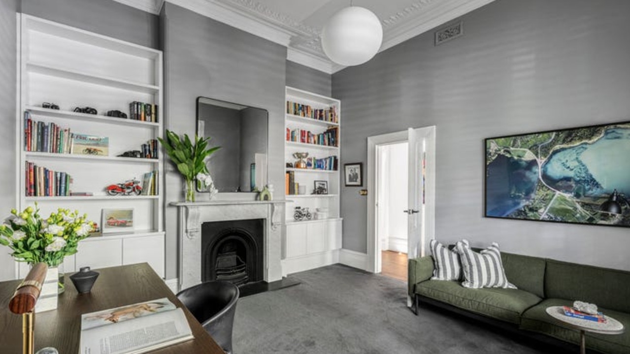 A marble fireplace in the library and study.
