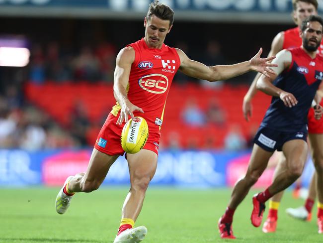 Lachie Weller of the Suns kicks during the round eight AFL match between the Gold Coast Suns and the Melbourne Demons at Metricon Stadium on May 11, 2019 in Gold Coast, Australia. (Photo by Chris Hyde/Getty Images)