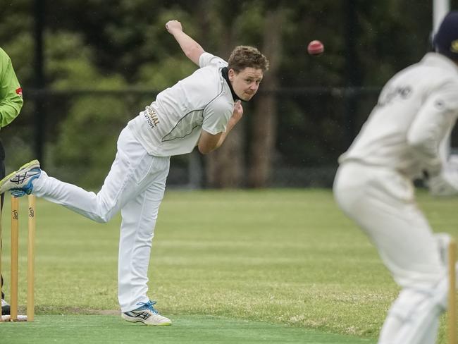 Luke Chevalier bowling for Seaford Tigers. Picture: Valeriu Campan