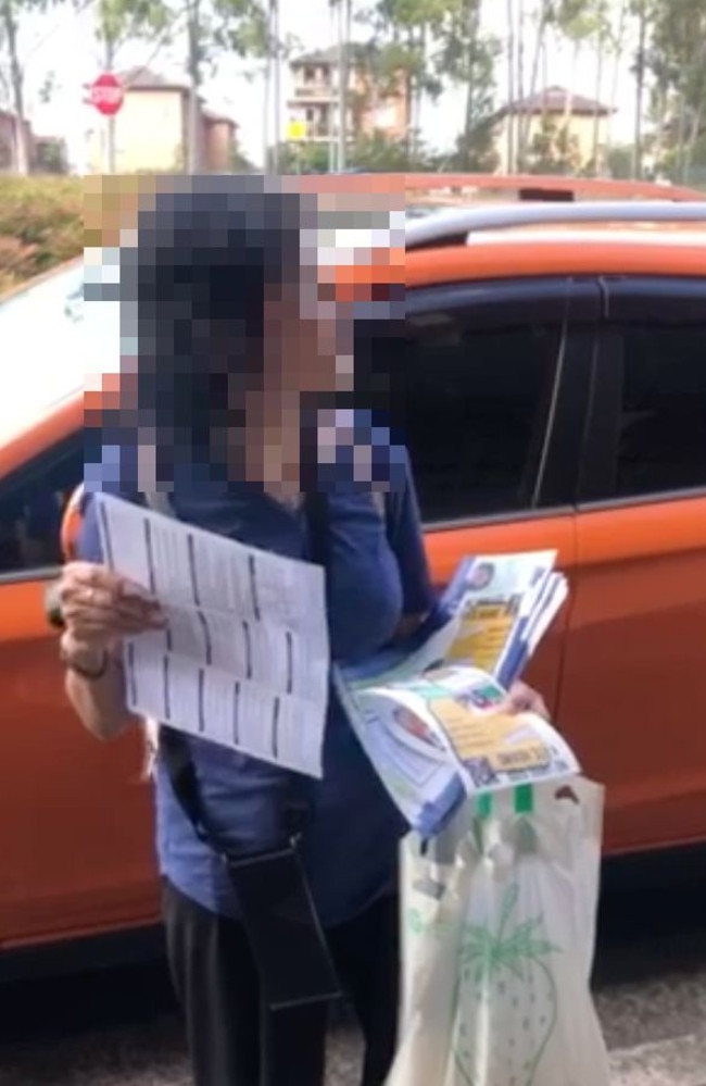 A Liberal Party spokesman confirmed the woman distributing the flyers was not a Liberal member or a member of the volunteer team. Picture: Supplied.