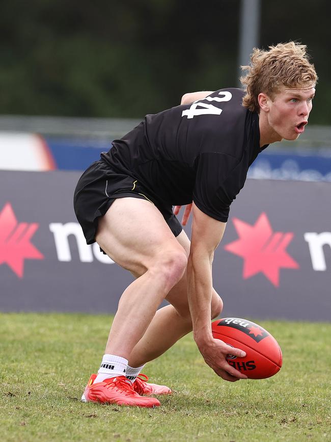 Ben Hobbs collects at ground level. Picture: Michael Klein.