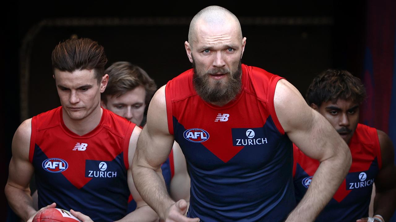 Max Gawn of the Demons leads the Dees onto the MCG. Pic: Michael Klein