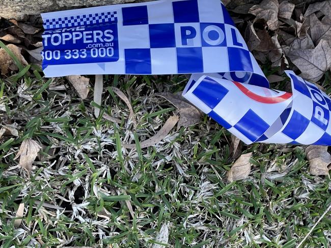 Police tape left near the scene of a home invasion at Seven Hills on Sunday July 31, 2022.