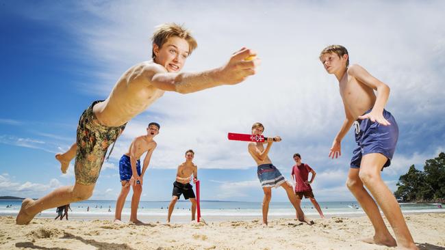 Archie Gouldson (catching the ball) was pictured on the front page of The Courier-Mail in 2017. Photo Lachie Millard