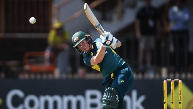 Alyssa Healy hits a boundary down the ground. Picture: David Gray / AFP