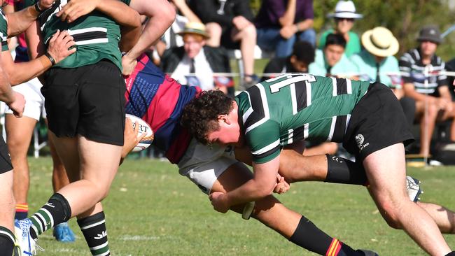 BSHS player get tackled hard First XV rugby match between BSHS and Brisbane Boys College Saturday September 4, 2021. Picture, John Gass