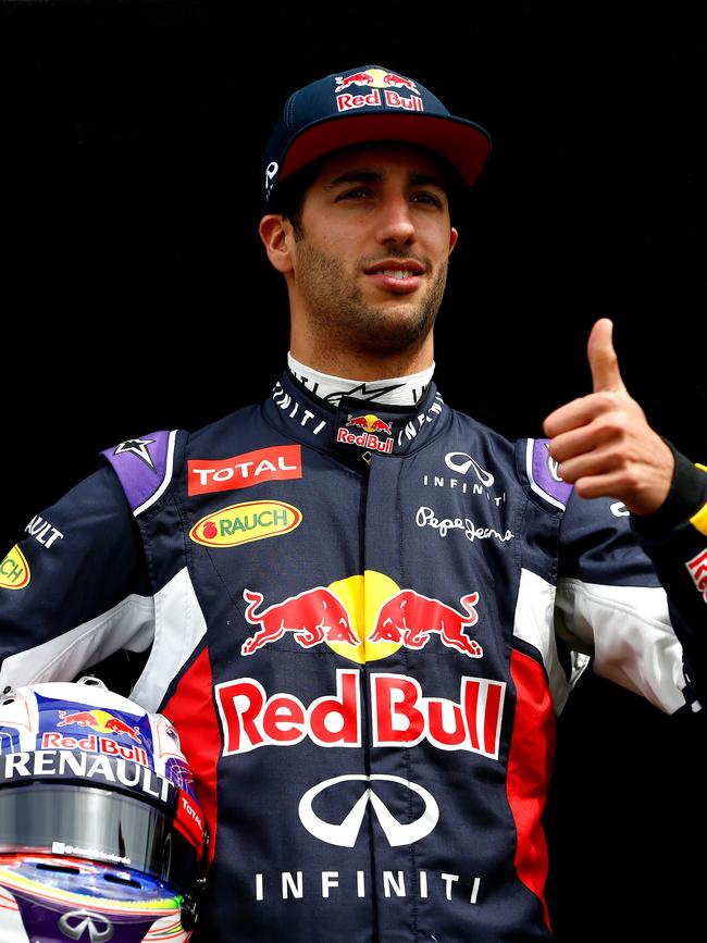 Daniel Ricciardo poses for photographers during previews to the Australian Formula One Grand Prix in Melbourne. Picture: Andrew Hone/Getty Images