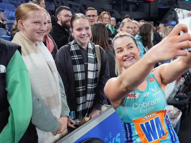 Mavericks’ Maisie Nankivell takes a selfie with fans, who are flocking back to Super Netball. Picture: Getty Images