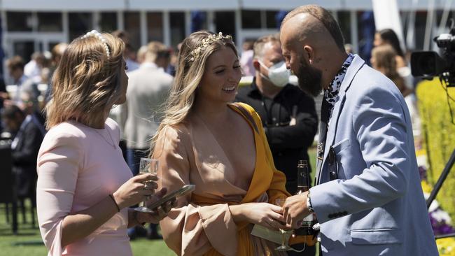 Racegoers were thrilled to be able to frock up. Picture: Brook Mitchell/Getty