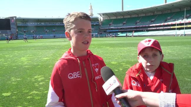 Sydney Swans track down two inspiring young fans