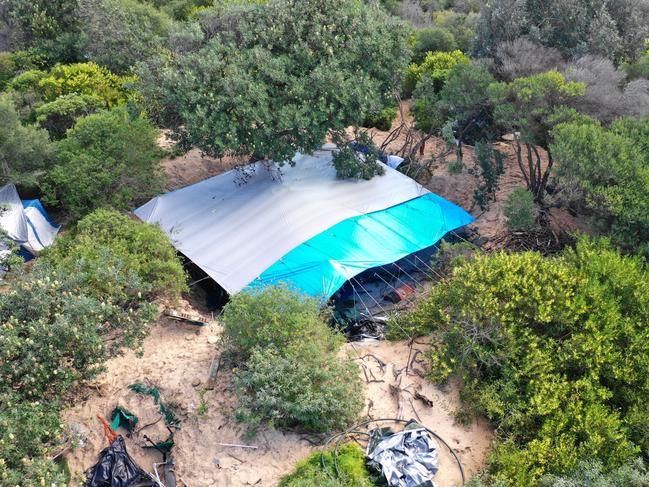 A makeshift campsite, photographed in August 2023, set up by homeless people in the sand dunes at Dee Why Beach. Picture: Manly Daily