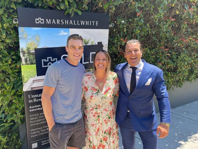 Leigh Fisher, wife Jodie and Marshall White's Matthew Pillios outside the couple's former home 5 Wentworth Ave, Sandringham