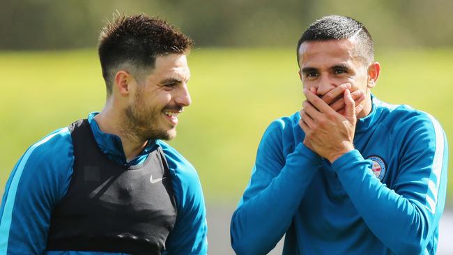 Tim Cahill (R) reacts with Bruno Fornaroli.