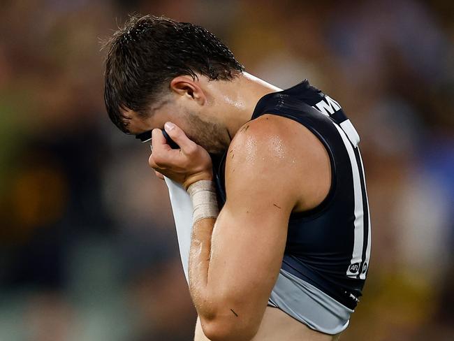 MELBOURNE, AUSTRALIA - MARCH 13: Brodie Kemp of the Blues looks dejected after a loss during the 2025 AFL Round 01 match between the Richmond Tigers and the Carlton Blues at the Melbourne Cricket Ground on March 13, 2025 in Melbourne, Australia. (Photo by Michael Willson/AFL Photos via Getty Images)