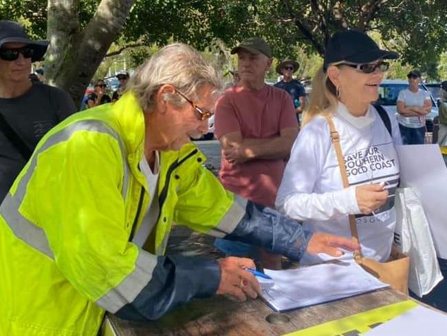 Save Our Southern Gold Coast supporters prepare for a rally against the trams going to the border.