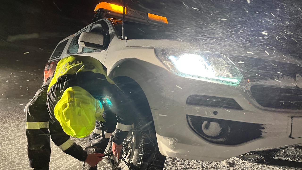 Hobart City Council workers brave think snow and blizzard conditions on their way to rescue walkers stranded on kunanyi/MtWellington. Picture: City of Hobart