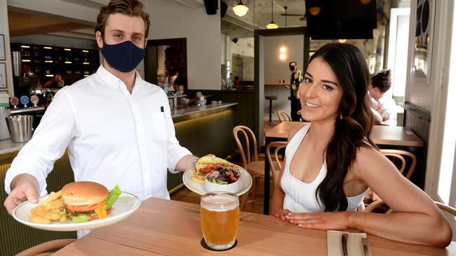 Hotel Collingwood waiter Jackson serves Herald Sun food critic Kara Monssen. Picture: Andrew Henshaw