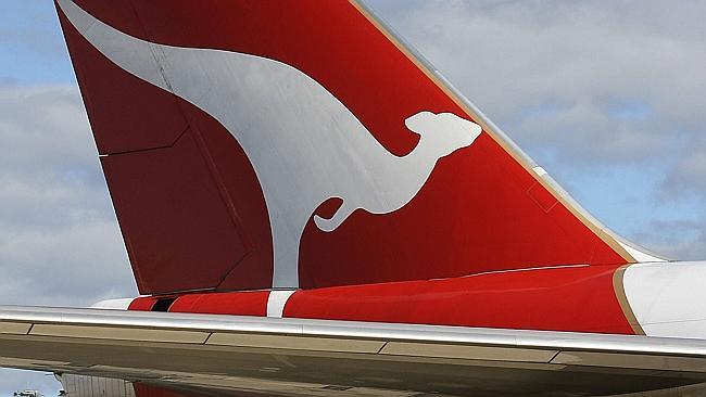 10 May 2006 Qantas planes sitting on the tarmac at Sydney Airport. AFP PicGreg/Wood - industry aviation aircraft logo logos f...