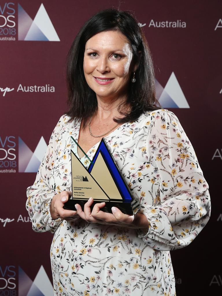 Shelley Strachan, editor of The Gympie Times, picks up the Achievements in Regional Journalism at the 2018 News Awards held at the Hyatt Regency in Sydney. Picture: Richard Dobson