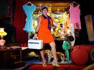 Time warp: Stacy Star, of the Vintage Palace, shows off her range of vintage clothing and furniture available in her backyard shed in Eureka. Picture: Jay Cronan