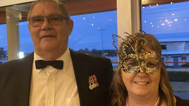 Greg and Julie McLaughlin celebrate at the Gympie RSL Masked Ball, April 29 2023.