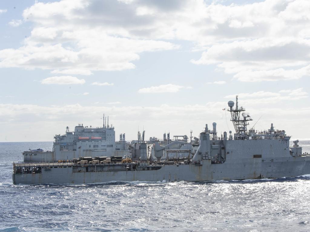 210722-N-XB010-1013 CORAL SEA (July 22, 2021) USS Germantown (LSD 24), foreground, and USNS Alan Shepard (T-AKE 3) steam in formation alongside partner nations and allies during Talisman Sabre (TS) 21. This is the ninth iteration of Talisman Sabre, a large-scale, bilateral military exercise between Australia and the U.S. involving more than 17,000 participants from seven nations. The month-long multi-domain exercise consists of a series of training events that reinforce the strong U.S./Australian alliance and demonstrate the U.S. MilitaryÃ¢â&#130;¬â&#132;¢s unwavering commitment to a free and open Indo-Pacific. (U.S. Navy photo by Mass Communication Specialist 2nd Class Desmond Parks)