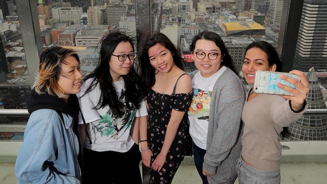 International students Judy Huang, Rachel Soh, Camelia Hoh, Chihito Nagasawa and Iman Shaukat in Melbourne. Picture: Stuart McEvoy