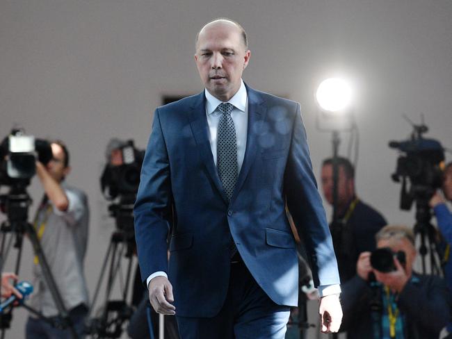 Minister for Home Affairs Peter Dutton leaves after a press conference at Parliament House in Canberra. Picture: AAP