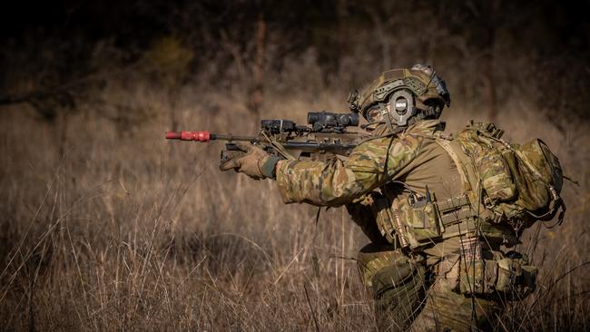 An Australian army soldier from the 3rd Battalion, Royal Australian Regiment, engages assaults an enemy position during a section attack conducted during the 2022 Duke of Gloucester Cup in Singleton. *** Local Caption *** Australian Army infantry soldiers from across Australia tested their core skills for the prestigious Duke of Gloucester Cup at the School of Infantry, near Singleton in NSW, July 31 - August 5 2022. The Duke of Gloucester Cup is the Armyâ€™s premier military skills competition, pitting the best Royal Australian Corps of Infantry rifle sections from each unit against one another through a series of challenging activities that test their core infantry skills, including marksmanship, tactics, teamwork and fitness. Along with the Duke of Gloucester Cup, five other trophies are awarded: Sir Arthur MacDonald Trophy for best foundation war-fighting skills; Gurkha Trophy for best live-fire shooting; Royal Ulster Rifles Trophy for best falling plate shooting; OSCMAR Trophy for best battle endurance; and the DSM Roche CSC Memorial Cup for best individual soldier. The Duke of Gloucester Cup was created by Prince Henry, Duke of Gloucester, in 1946, while serving as the Governor-General of Australia.