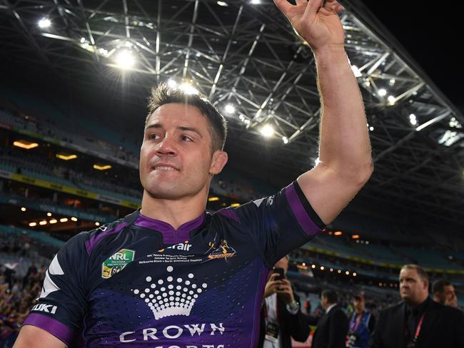 Cooper Cronk of the Storm celebrates victory over the Cowboys during the NRL grand final between the Melbourne Storm and the North Queensland Cowboys at ANZ Stadium in Sydney, Sunday, October 1, 2017. (AAP Image/Dan Himbrechts) NO ARCHIVING, EDITORIAL USE ONLY