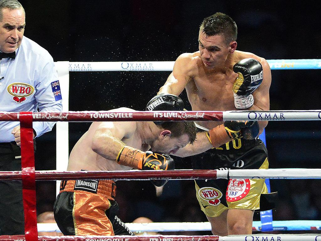 Tim Tszyu punches down at a ducking Jeff Horn. Picture: Matt Taylor