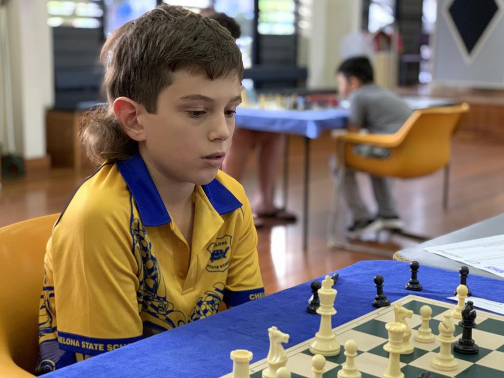 Chase Marshall thinks things through at the Mackay Chess Open on May 14. Picture: Duncan Evans