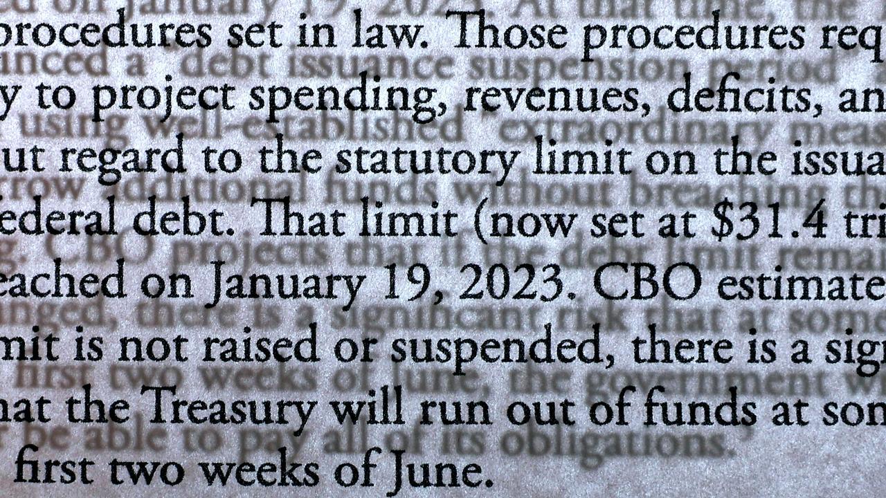 A page from a Congressional Budget Office report that predicts the US federal government will run out of funds sometime in the first two weeks of June if the debt limit is not raised. Picture: AFP