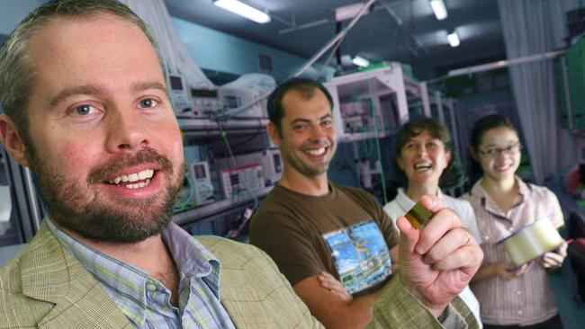 A 2007 photo of Prof Ben Eggleton (left) when he helped develop a CUDOS Photonic Chip with researchers at the University of Sydney and the Australian National University.