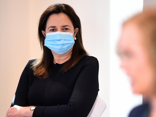 BRISBANE, AUSTRALIA - NewsWire Photos - JUNE 30, 2021.Queensland Premier Annastacia Palaszczuk watches Chief Health Officer Dr Jeannette Young during a Covid update press conference. Queensland has gone into a 3-day lockdown due to a Covid outbreak.Picture: NCA NewsWire / Dan Peled