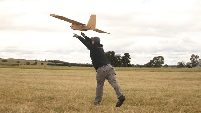 Sypaq’s Precision Payload Delivery System drone being demonstrated with a hand-launch. Picture: Supplied