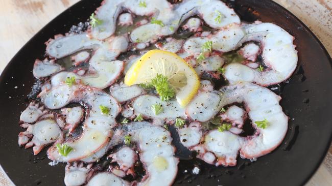 Carpaccio Di Polpo; octopus carpaccio served with parsley and lemon pearls. Photo by Richard Gosling