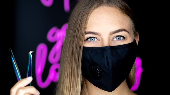 Sheyla Nathanael from Moore Beauty prepares to get back to work on Friday with new restrictions in place including social distancing and facemasks. Picture: Che Chorley