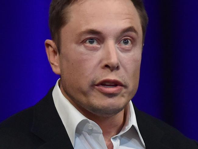 (FILES) In this file photo taken on September 29, 2017 Billionaire entrepreneur and founder of SpaceX Elon Musk speaks at the 68th International Astronautical Congress 2017 in Adelaide.  Bases on the moon and Mars could help preserve human civilization and hasten its regeneration on earth in the event of a third world war, billionaire entrepreneur Elon Musk, said on March 11, 2018. Musk, the founder of rocket and spacecraft company SpaceX, said the company's interplanetary ship could begin test flights as soon as next year. There is 