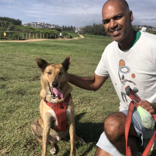 Dog owner Rob Mathunni, of Dee Why, with his dog, Mate. Picture; Jim O’Rourke