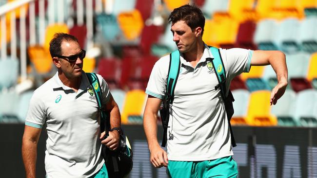 Langer chats with his new skipper at the Gabba.