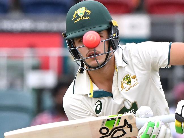 TOPSHOT - Australian Prime minister XIâs Sam Konstas plays a shot during the tour cricket match between the Prime Minister's XI and India at Manuka Oval in Canberra on December 1, 2024. (Photo by SAEED KHAN / AFP) / -- IMAGE RESTRICTED TO EDITORIAL USE - STRICTLY NO COMMERCIAL USE --