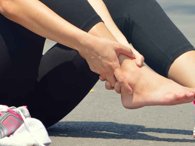 Gold Coast Suns - My Life - Diamond Bridge Clinic - Young woman suffering from an ankle injury while exercising and running.