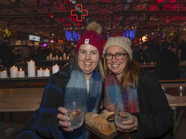 Heidi Donnelly from Melbourne and Nicole Roberts from Albury at Winter Feast, part of Dark Mofo at Hobart Waterfront. Picture: Caroline Tan