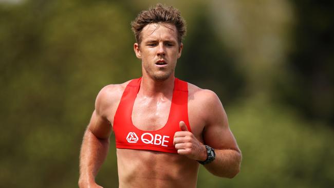 Luke Parker runs during a Sydney training session at Lakeside Oval. Picture: Mark Kolbe/Getty